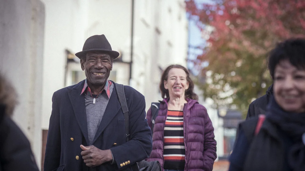 Group of older people walking outside